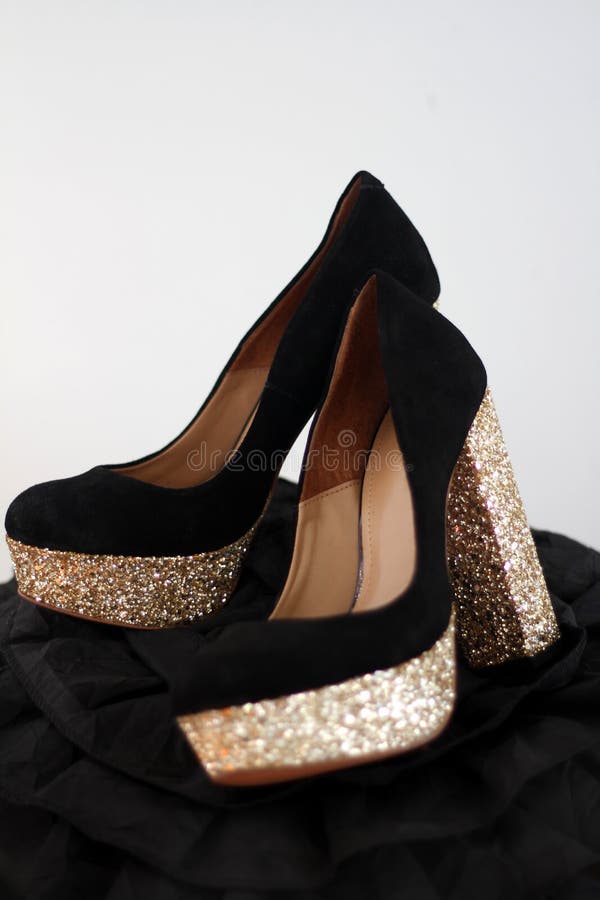 Black and gold high heels stock image. Image of golden 50309253