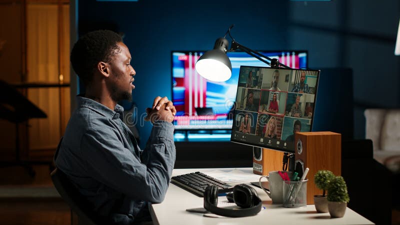 Black guy meeting with group of individuals on web video conference stock photos