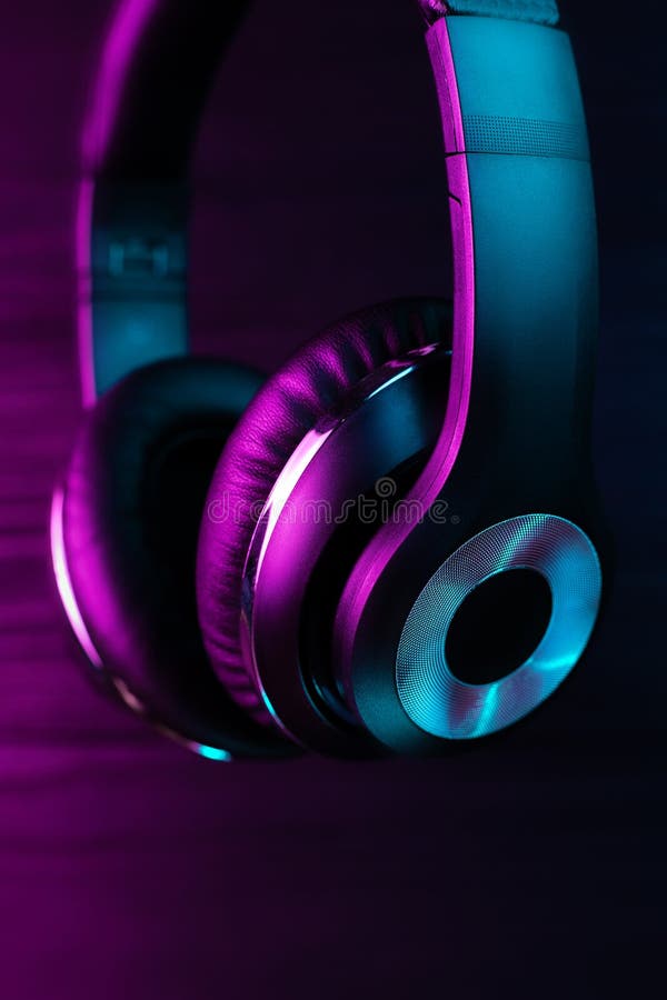 Black Headphone on Dark Wooden Background. Stylish Wireless Headset in Neon  Light. Stock Photo - Image of chillout, musical: 172141400