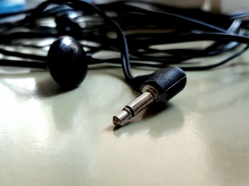 Headphones plug. stock image. Image of rolled, headphone 121417427