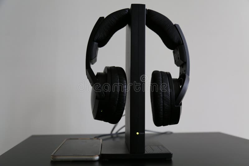 Black headphones on stand