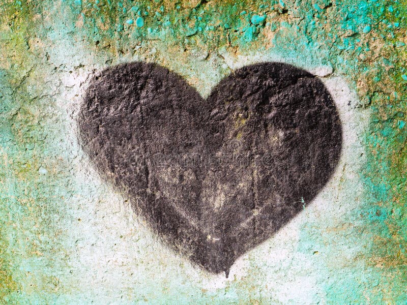 Black Heart Painted on a Concrete Wall with Spray Paint Stock Image