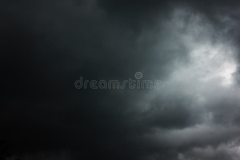 Black heavy clouds with hole royalty free stock photos