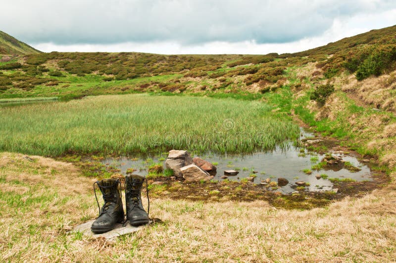 Black hiking boots stock photo. Image of outdoors, muddy 73418456