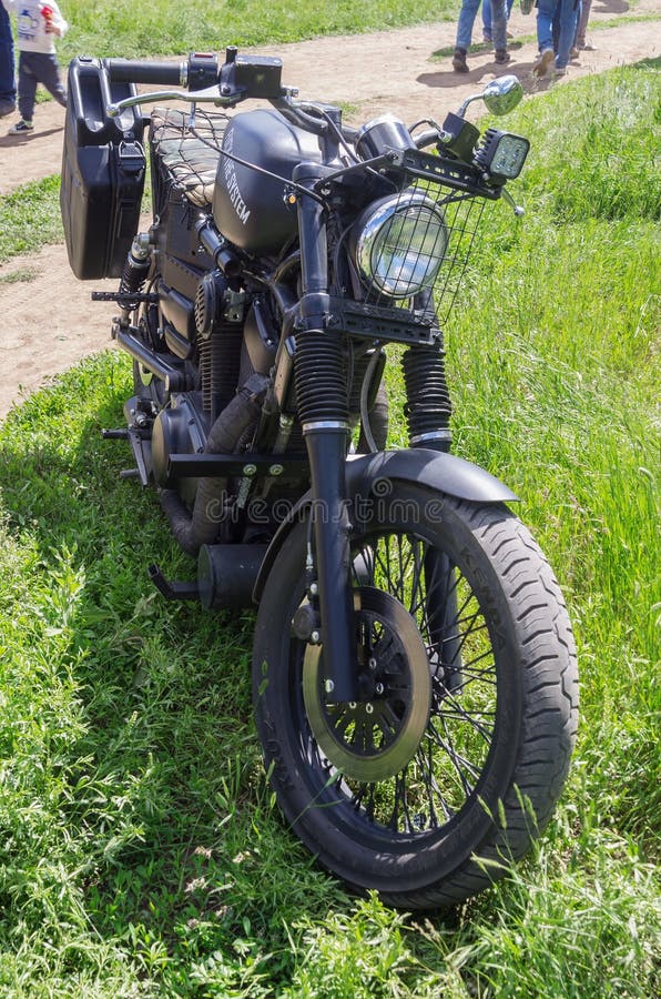 Black Homemade Motorcycle with the Inscription on the Gas Tank `Fuck the System` Editorial Stock Photo pic