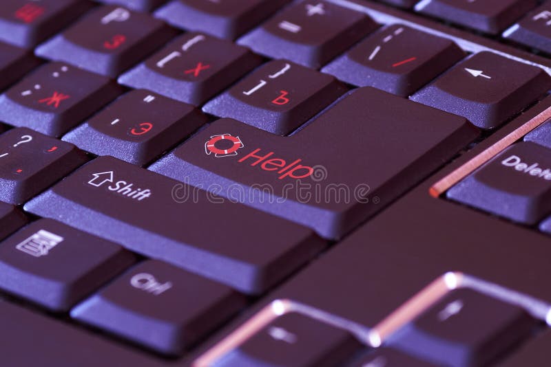 Black keyboard with a red word help on enter key