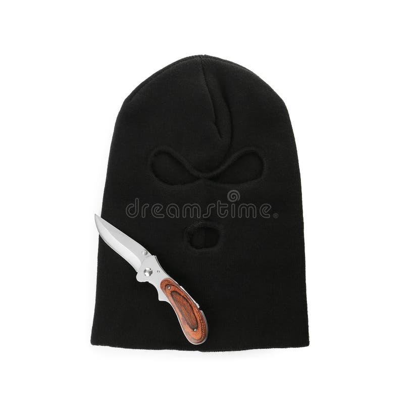 Black Knitted Balaclava and Knife on White Background, Top View Stock