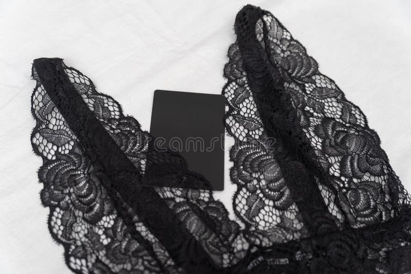 White Satin Bra With Black Lace Isolated Over White Stock Photo