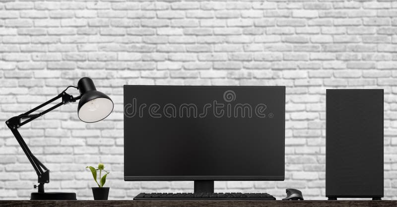 Black lamp, desktop computer and lcd display stand on table royalty free stock images