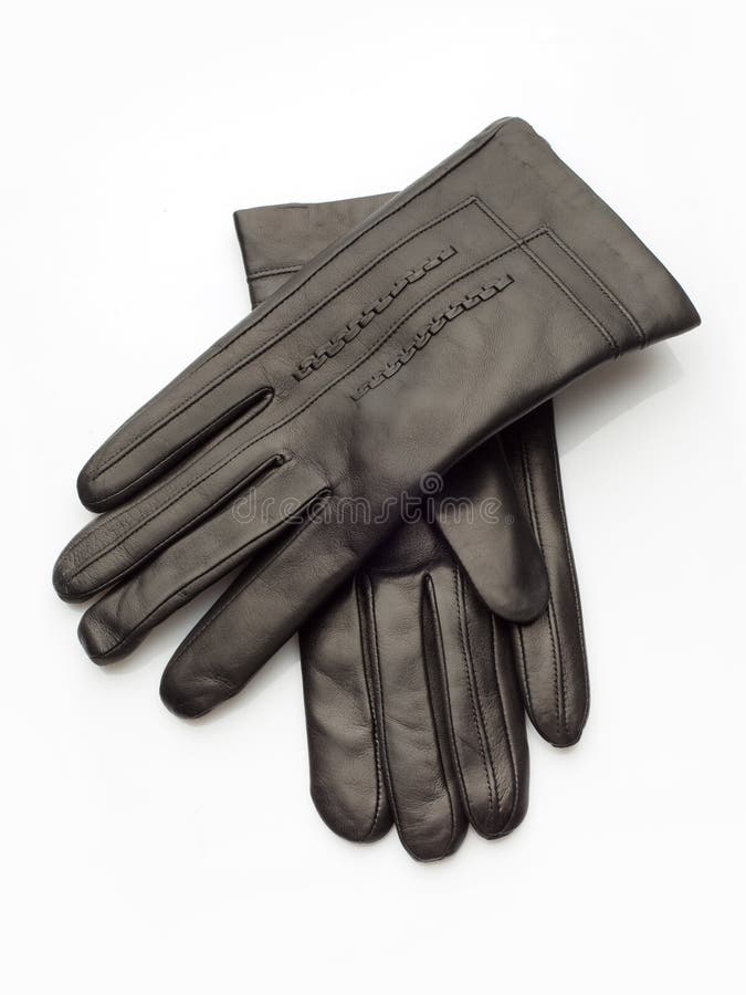 Black leather gloves over white background. Button clasp stock images, royalty-free photos and pictures