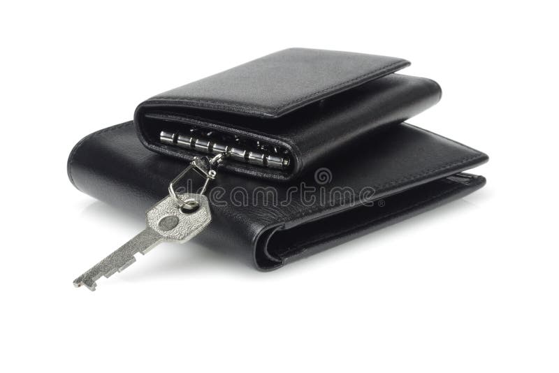 Black leather key case and wallet on white background. Black leather key case and wallet on white background