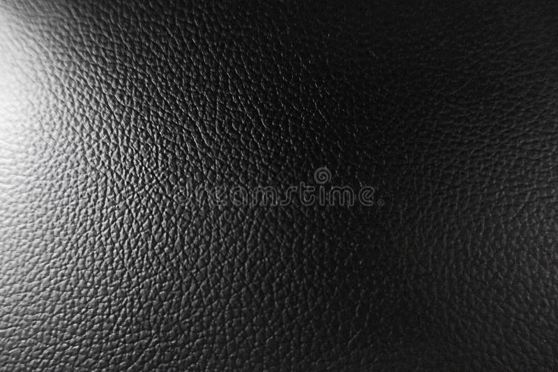 Black Leather Sofa, Pattern Surface Texture. Closeup of Interior