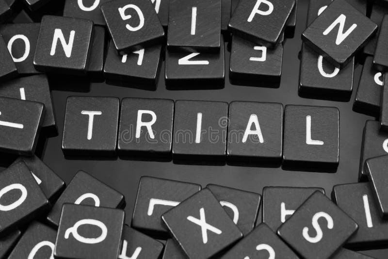 Black Letter Tiles Spelling the Word & X22;trial& X22; Stock Image