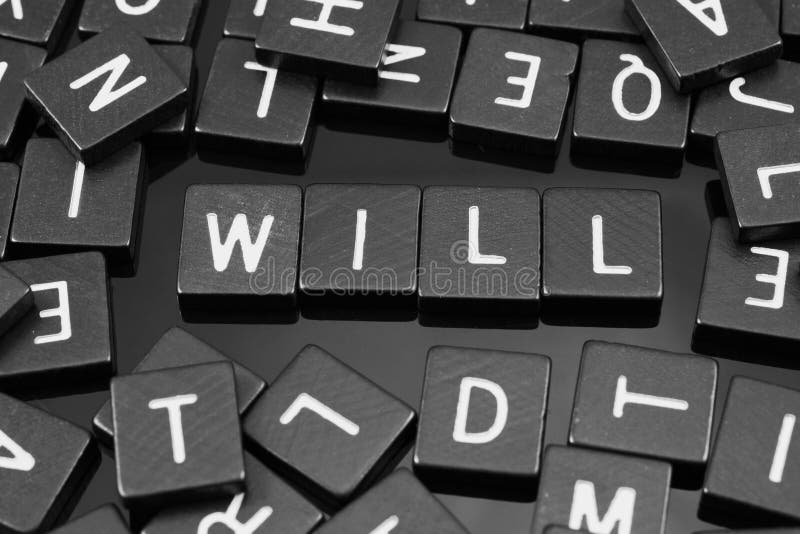 Black Letter Tiles Spelling the Word & X22;will& X22; Stock Photo