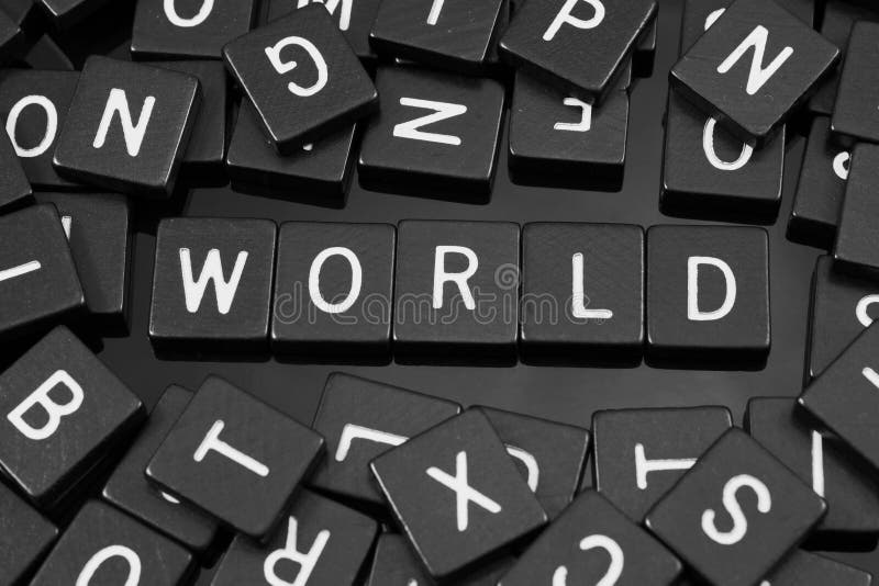 Black Letter Tiles Spelling the Word & X22;world& X22; Stock Image