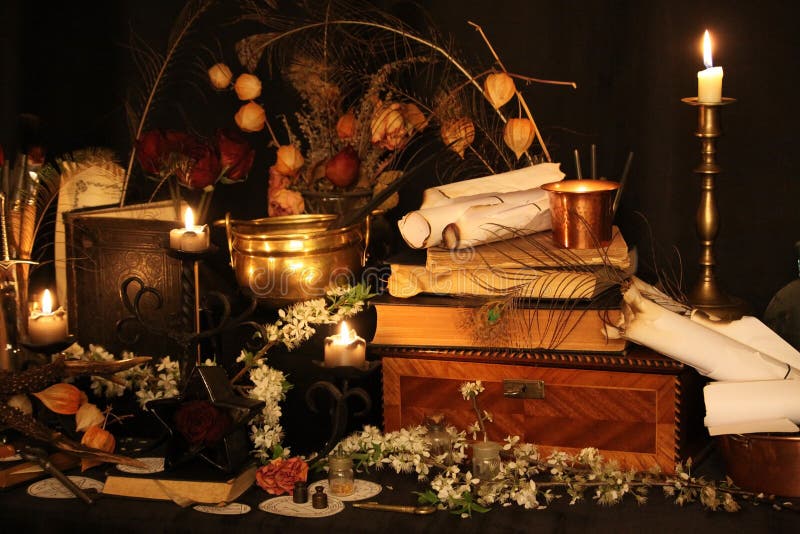 Still life Witchcraft composition with candles, crystal, magic book and pentagram symbol. Halloween and occult concept, black magic ritual. Still life Witchcraft composition with candles, crystal, magic book and pentagram symbol. Halloween and occult concept, black magic ritual.