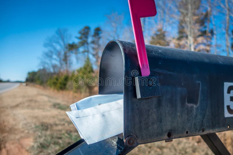 Black mail box and post office mail with blue sky royalty free stock photos