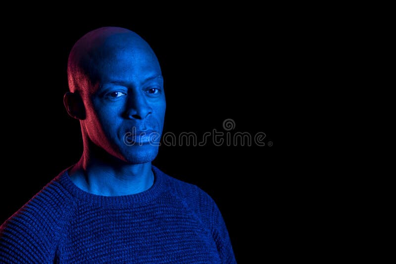 Studio Photo with Blue Light of a Black Man Looking Sideways Stock Photo -  Image of artistic, person: 173406154