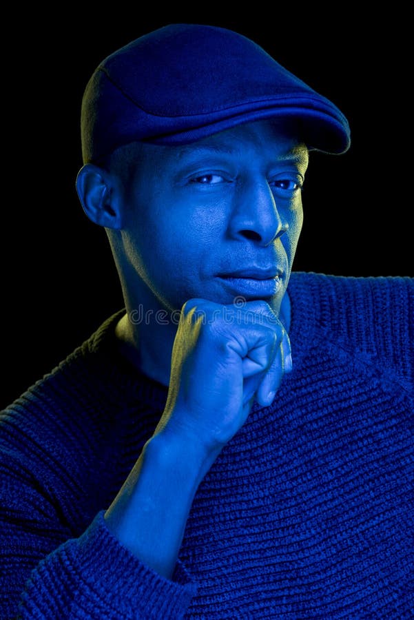 Studio Photo with Blue Light of a Black Man Looking Sideways Stock Photo -  Image of artistic, person: 173406154