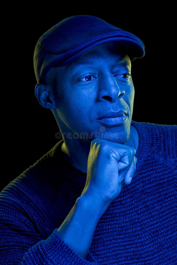 Studio Photo with Blue Light of a Black Man Looking Sideways Stock Photo -  Image of artistic, person: 173406154