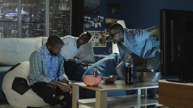 Having Fun at Home. Cheerful Black Teen Guy with Joystick Playing Online  Computer Games, Sitting on Couch Indoors Stock Image - Image of computer,  person: 227478857