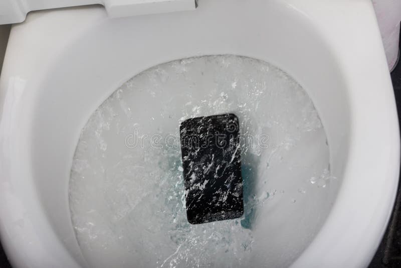 Black Mobile Phone Falling into Toilet Flushing Stock Image Image of