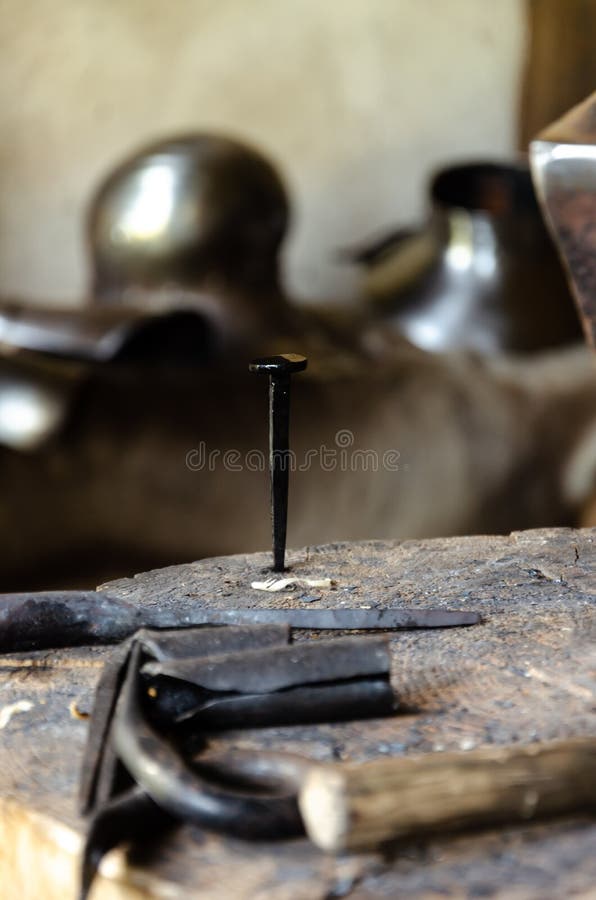 Black nail in the stump at weapons and armor workshop