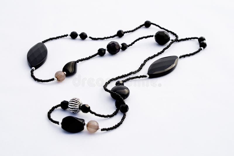 Black necklace isolated stock images