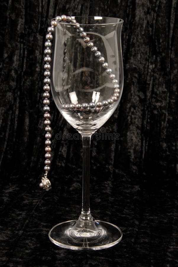 Pearls in Wine Glass stock image. Image of decorative 18017015