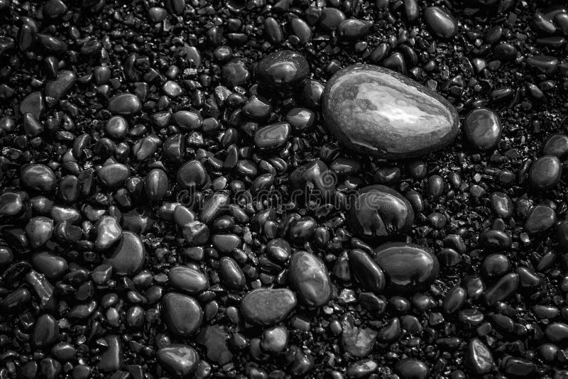 Black pebbles background pattern