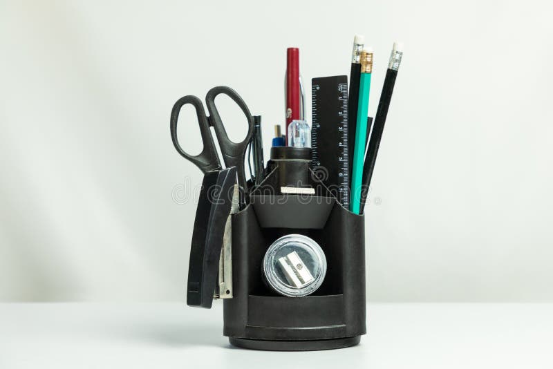 Black pencil tool holder table desk organizer isolated on white