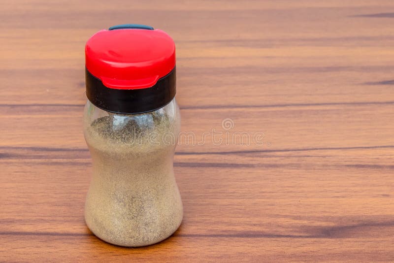 Black Pepper Shaker Isolated on Wooden Background Stock Image Image