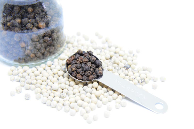 Black peppers in teaspoon stock image. Image of pile 85019371
