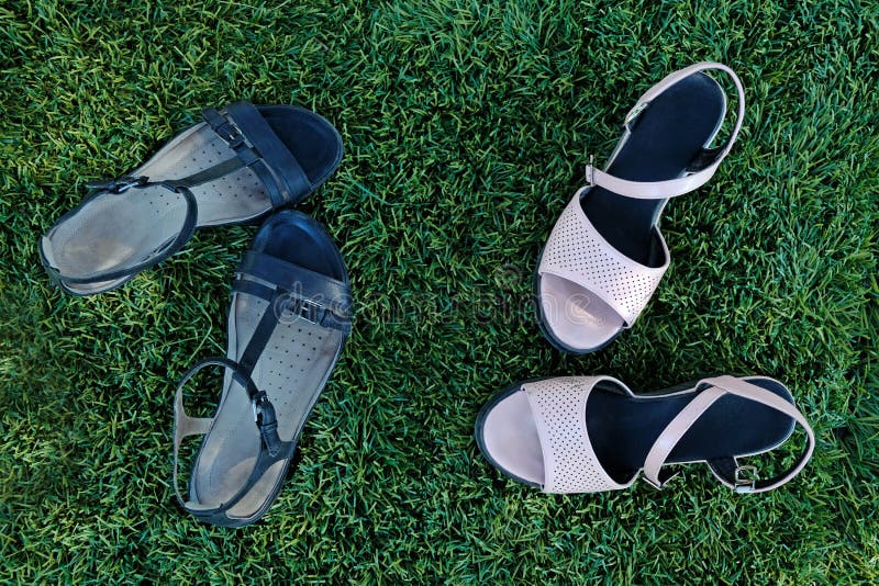 Black and Pink Women`s Sandals on the Grass Top View. Stock Photo ...