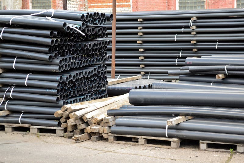 Black Plastic Pipes. Manufacture of Plastic Pipes Stock Photo Image