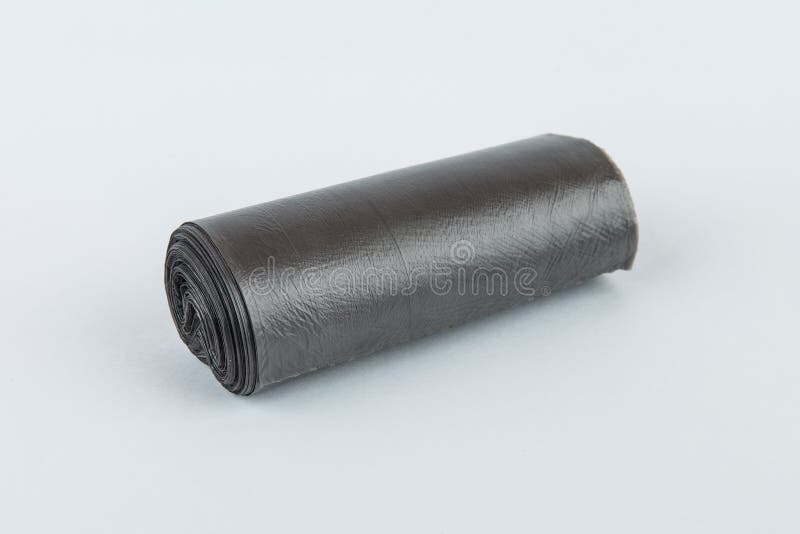 Black plastic polyethylene garbage bags roll isolated over the white background. royalty free stock image Black plastic polyethylene garbage bags roll isolated over the white background. royalty free stock image