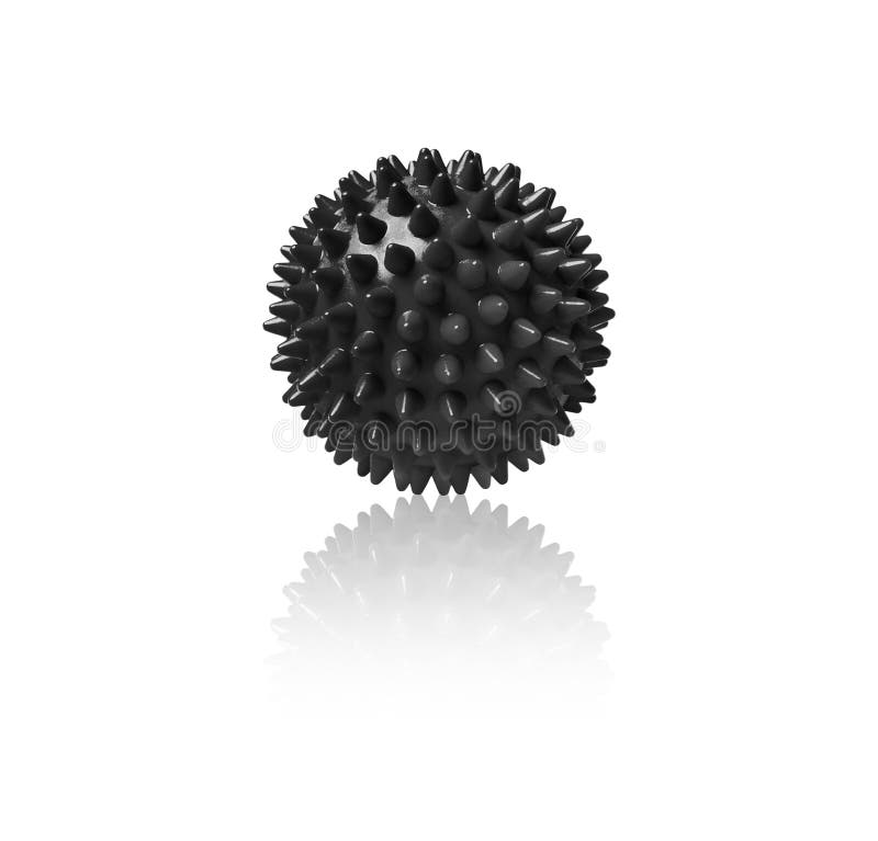 Black plastic spiny massage ball isolated on white. Concept of physiotherapy or fitness. Closeup of a colorful rubber ball for dog teeth on a white color background. Corona virus model.