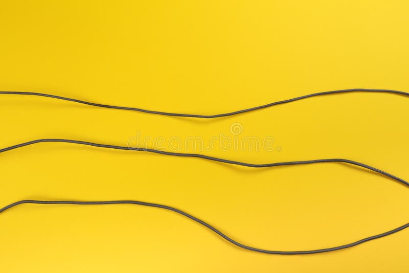 Black power cable set socket on yellow background stock image