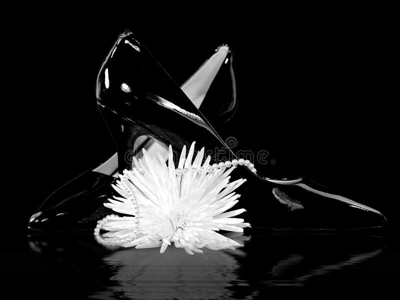 Black pumps and pearls stock image. Image of shine, reflect 50903911
