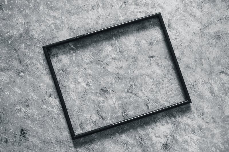 Black rectangular picture frame mock-up with copy space for yout text or image on top of hand painted grey background royalty free stock photos Black rectangular picture frame mock-up with copy space for yout text or image on top of hand painted grey background royalty free stock photos