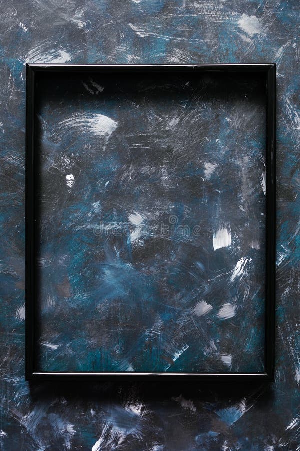 Black rectangular picture frame mock-up with copy space for yout text or image on top of hand painted navy blue background royalty free stock photos Black rectangular picture frame mock-up with copy space for yout text or image on top of hand painted navy blue background royalty free stock photos