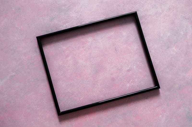 Black rectangular picture frame mock-up with copy space for yout text or image on top of light pink background stock image Black rectangular picture frame mock-up with copy space for yout text or image on top of light pink background stock image