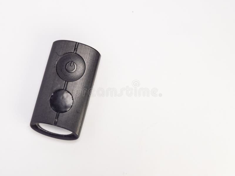 Black Remote Control Device with Power Button on White Background royalty free stock image