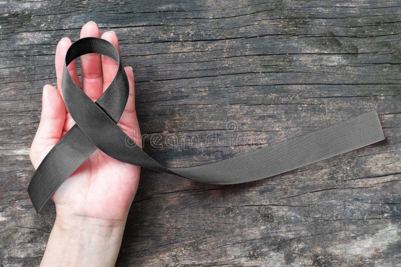 Black Ribbon symbol raising public awareness on Melanoma and skin cancer prevention, mourning for the death loss of victims