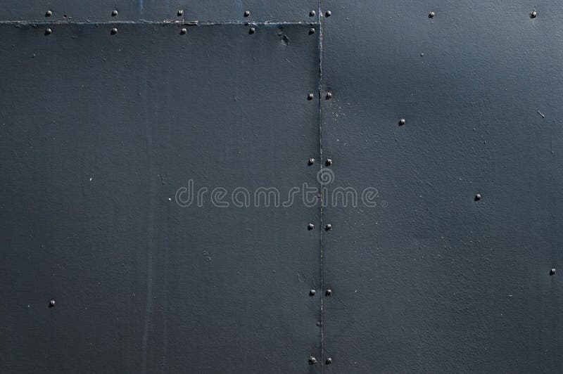 Black Riveted Sheet Metal Background royalty free stock photography
