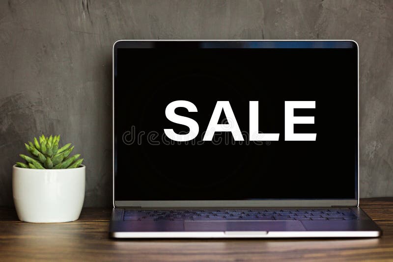 Black Screen Laptop Front View On Office Table With Word Sale