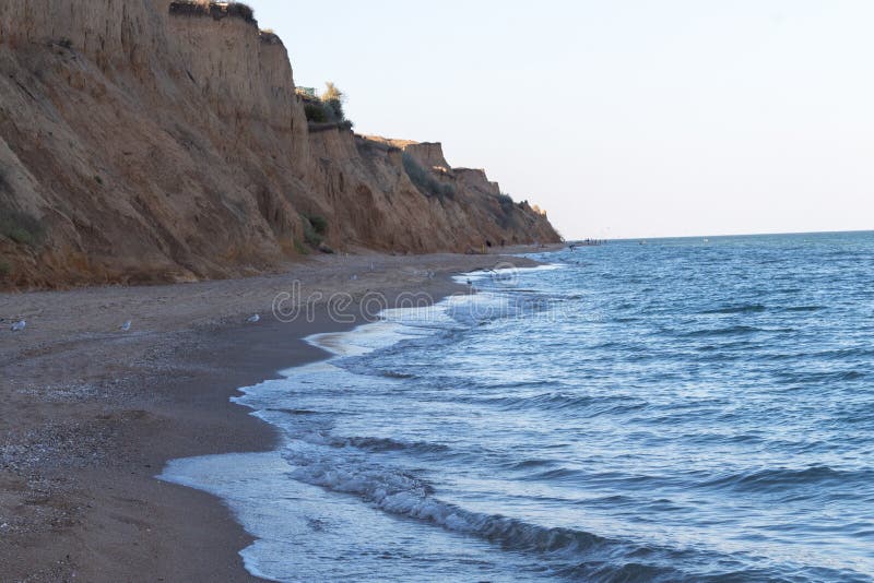 The Black Sea Coast Sandy Cliff And Blue Sky With Single Clouds In Summer Sunny Day Sanzhiika