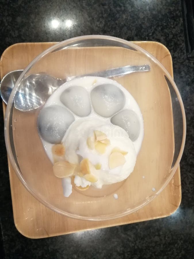 Black Sesame Seed Dumplings in Coconut Cream with Icecream Stock Image