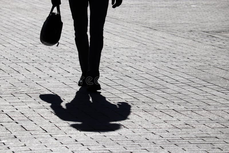 Silhouette of Man Walking with a Cane, Long Shadow on Pavement Stock Image  - Image of pain, feet: 142033331