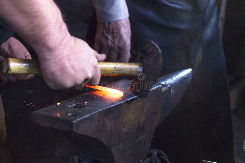 Black Smith Heating Up an Iron Stock Image Image of ancient, industry
